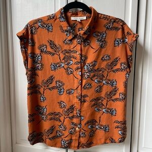 Black Rainn size M orange w/blue+black print rayon cap sleeve button front shirt